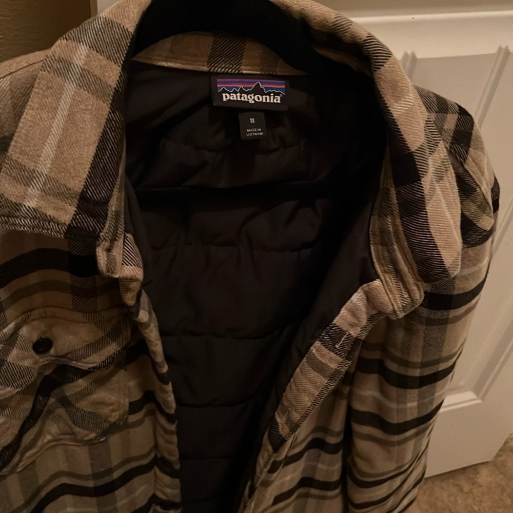 men’s Patagonia, insulated flannel jacket, size medium.